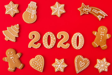 Wall Mural - Top above high angle view photo of festive x-mas composition of ginger bread cookies man snowman tree star falling heart letters making 2020 lie isolated over shine color background