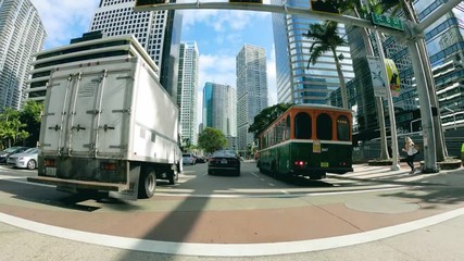 Wall Mural - MIAMI, FL - APRIL 2018: Time lapse of downtown traffic on a sunny day. View from a moving car