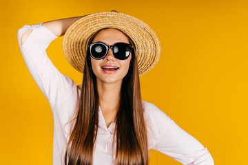 girl with black glasses and a hat, with the emotion 