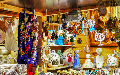 Wall Mural - Handmade ceramic souvenirs in Stand at Christmas market in old Riga, Latvia. Europe in winter. Street Xmas and holiday fair. Advent Decoration and Stalls with Crafts Items on Bazaar