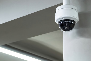 A review of surveillance cameras on white background. Security concept. Facial recognition. Program search for criminals.