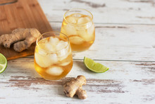 Fresh Ginger Ale With Lime And Ice Or Kombucha In Bottle - Homemade Lemon And Ginger Organic Probiotic Drink.