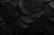 Leinwandbild Motiv Black background. Background from autumn fallen leaves closeup. Black and white photo.