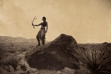 Mystical Power Shamanic Woman With A Deer Antler In The Desert. 