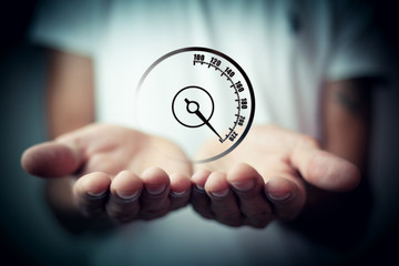 man holding a speedometer icon in his hands a sharp acceleration of speed