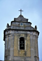 an old church tower with a bell