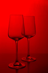 Rose wine in the glass at white background, romantic and elegant wine photo with copy space