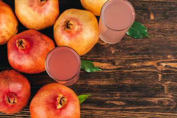 Sticker - Fresh pomegranate juice on wooden table close up