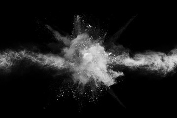 Wall Mural - white powder explosion on black background. colored cloud. colorful dust explode. paint holi.