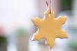 Christmas decor ceramic snowflake, ornament hanging on sacking threads