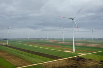 Poster - Drone photo of wind turbines on a field in Lodz Province, Poland