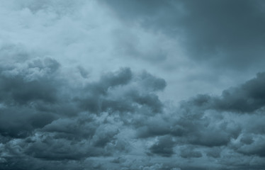 Wall Mural - dark dramatic sky and clouds. background for death and sad concept. gray sky and fluffy white clouds