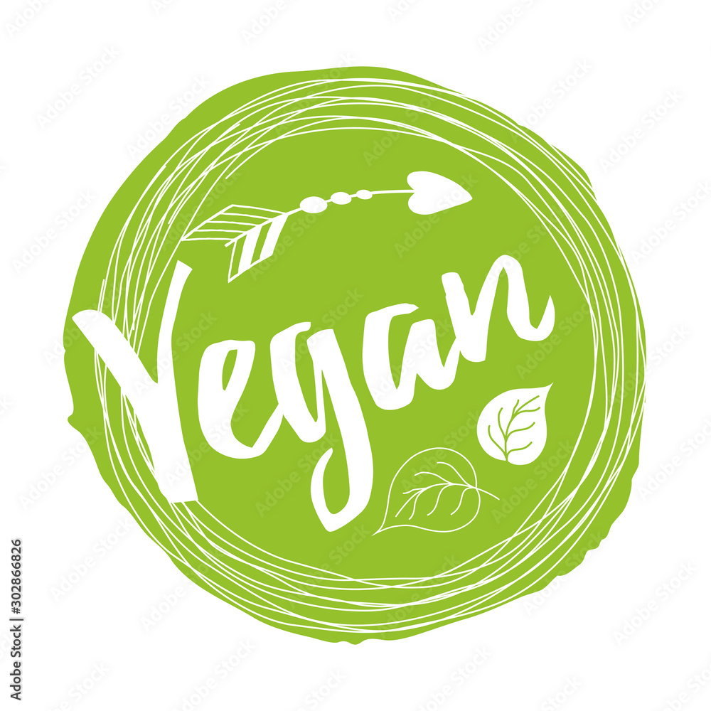 Handwritten lettering sign Vegan for restaurant, cafe menu on the green spot - obrazy, fototapety, plakaty 