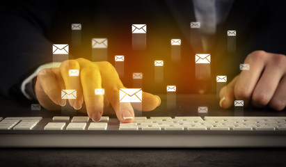 Sticker - Business woman typing on keyboard with mail icons around