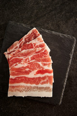 Canvas Print - Thin sliced raw pork BBQ 