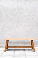 Leinwandbilder - grey concrete wall wooden modern chair