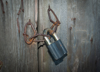 chain lock on old wooden barn door