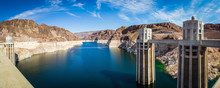Panorama image looking into Lake Meade from the Hoover dam with the bleached high waterline of the dam.