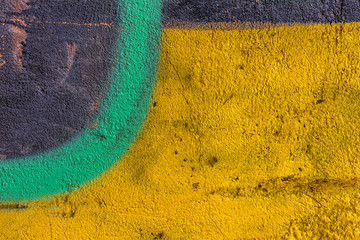 Wall Mural - Abstract creative drawing fashion colors on the walls of the city. Urban texture background