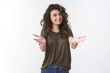 Here You Are. Grateful Charming Young Caucasian Curly-haired Girl Praise You Thanking Help Pointing Camera Extended Arms Smiling Broadly Feel Thankful Appreciate Cherish Friend, White Background