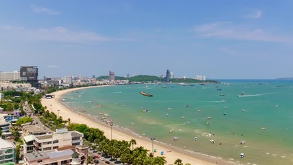 Wall Mural - Time-Lapse: Pattaya bay beach harbor and city in sunny day, Chonburi, Thailand; Tilt down