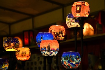 Wall Mural - Christmas Ornaments in a Christmas Market. Illuminated spheres.