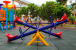 View playground in garden park colorful playground for children