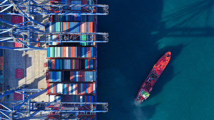 Aerial top down photo of industrial cargo container logistics terminal