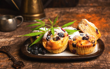 Wall Mural - Homemade marijuana muffins with berry fruit