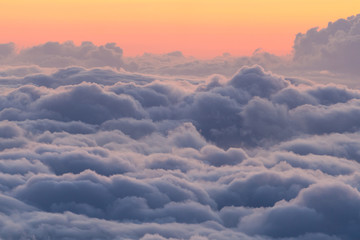 Beautiful colorful dramatic sunset above clouds from Haleakala National Park.