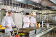 © davit85 - Modern kitchen. The chefs prepare meals in the restaurant's kitchen.