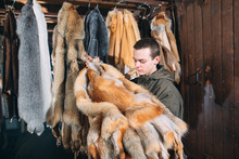 A Young Man Hangs Up The Fur After Treatment.