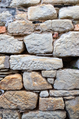 Wall Mural - Soft stone block wall with large gaps and cracks 