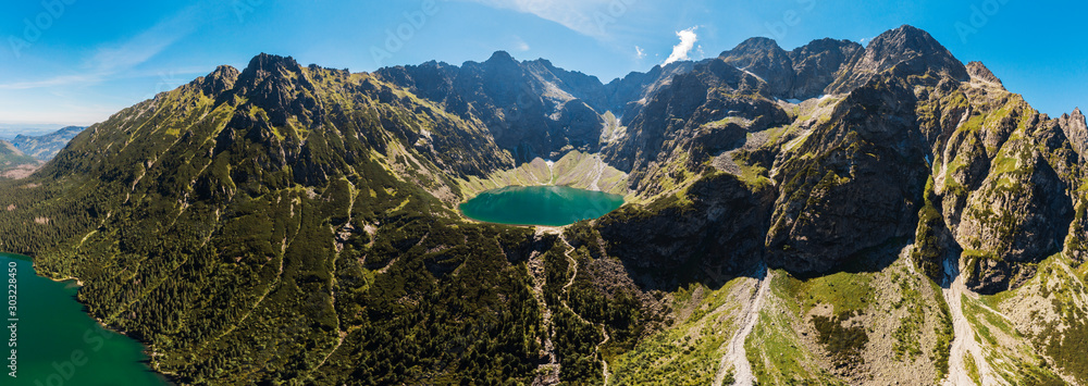Panorama Aerial view of Black Lake below Mount Rysy. It overlooks the nearby lake of Morskie Oko, or Eye of the Sea in Tatra Mountains, in southern Poland - obrazy, fototapety, plakaty 
