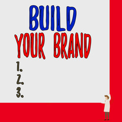 Text sign showing Build Your Brand. Business photo showcasing enhancing brand equity using advertising campaigns One man professor wear white coat red tie hold big board use two hands