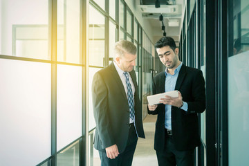 Wall Mural - Businessmen with tablet computer