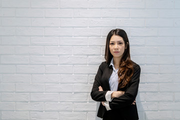 Poster - Confident Asian business woman with arms crossed