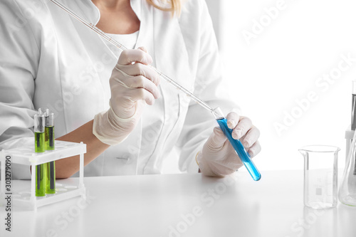 Scientist working with samples in laboratory