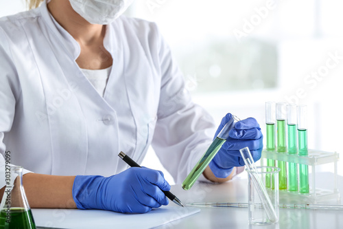 Scientist working with samples in laboratory