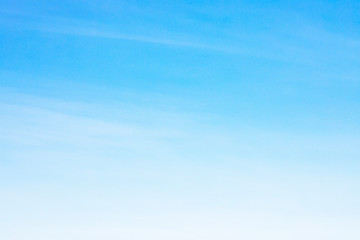 Wall Mural - fantastic soft white clouds against blue sky and copy space.