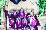 Fototapeta Kuchnia - Various colorful fresh vegetables eggplants in the fruit market, Catania, Sicily, Italy.