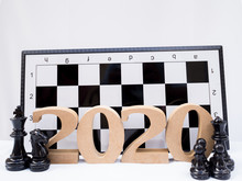2020 Wooden Character With Chess On White Background, Have A Nice Holiday On This New Year