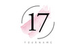 Number 17 Watercolor Stroke Logo Design with Circular Brush Pattern.