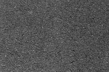 Asphalt road surface or black street background.