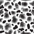 © Tanya - Seamless abstract pattern. Black isolated spots of different shapes, sizes and textures on a white background. Elements are randomly scattered.