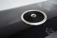 Modern Induction Cooker With A Black Glass Surface And Integrated Hood In The Kitchen