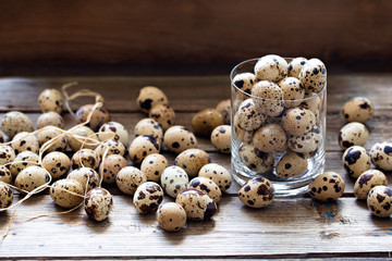 Quail eggs on wooden table