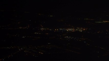 Wall Mural - European city at night. View from the plane.