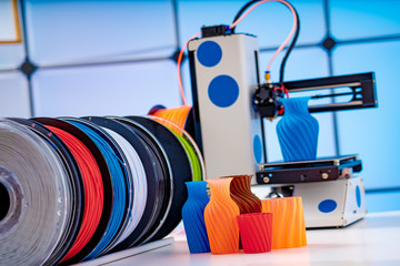 Sticker - 3D Printer Plastic filament for 3D printer and printed products in the interior of the design office