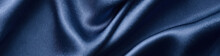 Silver Silk Background With A Folds.  Abstract Texture Of Rippled Silk Surface, Wide Long Banner